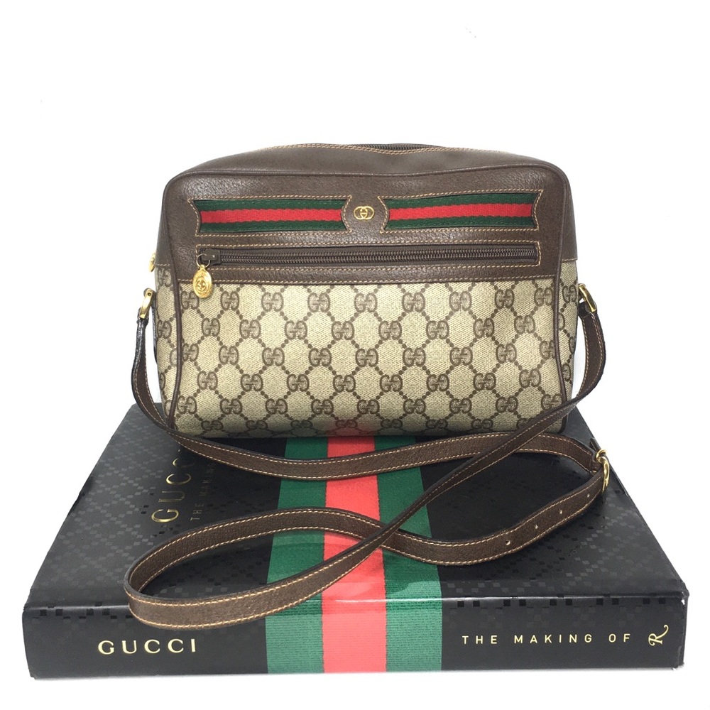 Authentic Gucci brown monogram coated canvas crossbody bag
